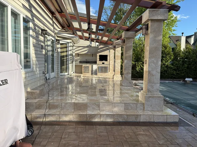 Patio and outdoor kitchen under the pergola